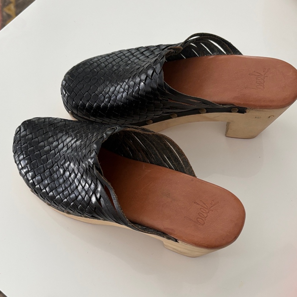 Beeks Black Woven Leather Clogs